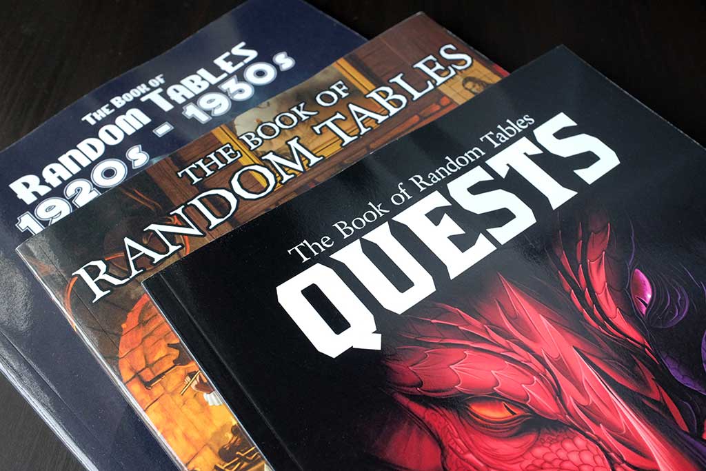 image of three books - the book of random tables quests, inns and taverns, 1920s - 1930s